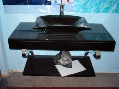 Stone bathroom sinks, granite sinks, marble sinks, bath fixtures, bath basins, undermount sinks, pedestal, self rimming, vessel mount, vessel, wall hung.